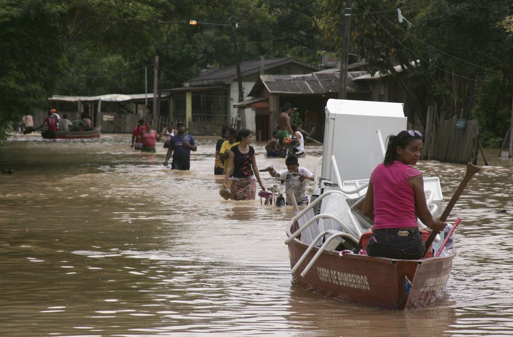 Brazil says floods driving thousands from homes
