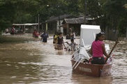Brazil says floods driving thousands from homes
