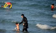 Viral photos add fuel to French burkini debate