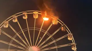 Ferris wheel catches fire with people on board in Germany