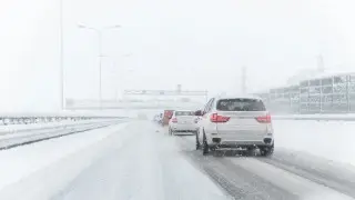 Which highways were closed due to bad weather in Kazakhstan