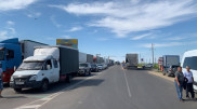 Where will electronic queuing system be implemented for entry into Kazakhstan?