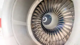 Airport panic: Bodybuilder jumps into running plane engine