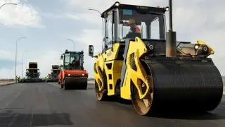 What roads are promised to be repaired and built in 2025 in Kazakhstan