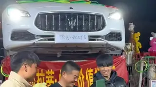 Chinese man won a sports car in a children's game