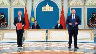 What documents were signed by Kazakhstan and China following talks in Astana