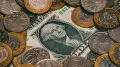 Dollar falls below psychological threshold in trading