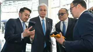 Tokayev shown first cryptocurrency payment in Kazakhstan