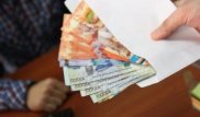 Астанадағы "Жылжымайтын мүлік орталығы" РМК қызметкерлері парамен ұсталды
