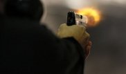 Екібастұзда бұзақылар прокуратура мен полиция қызметкерлерінің бетіне оқ атқан