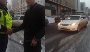 Астанада жүргізуші полицейді үш мәрте қағып, капотында сүйреген