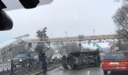Алматыда инкассаторлар көлігі аударылып кетті