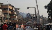 Иранда 17 қабатты ғимараттың құлаған сәті түсірілген видео пайда болды