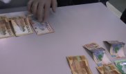 Алматыда ХҚКО-да кезекті жеделдету үшін ақша алғандар ұсталды