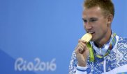 Алматыда олимпиада чемпионы Баландиннің көлігінен айнасын шешіп кетті