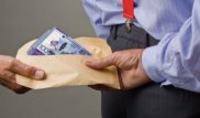 Ақтөбеде экономикалық тергеу қызметінің тергеушісі 1,7 миллион теңге пара алған