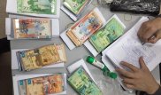 ҰҚК Алматыда шетелдіктерге жалған құжаттар жасаған қылмыстық топты ұстады