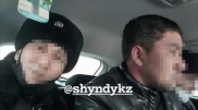 Полицейдің Шымкентте әйелді зорламақ болған күдіктімен түскен селфиіне қатысты тексеріс басталды