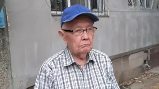 Пәтерінен айырылған профессорға белгісіз азамат 23 млн теңге әкеліп берді