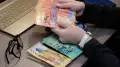 Қазақстанда жәрдемақыдан 1 миллиард ұрланды: алаяқ схема әшкереленді