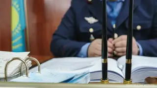 Әйелдің мәйіті мен ес-түссіз жатқан полицей: Қарағандыда ПБ басшысы мен орынбасары қызметтерінен босатылды